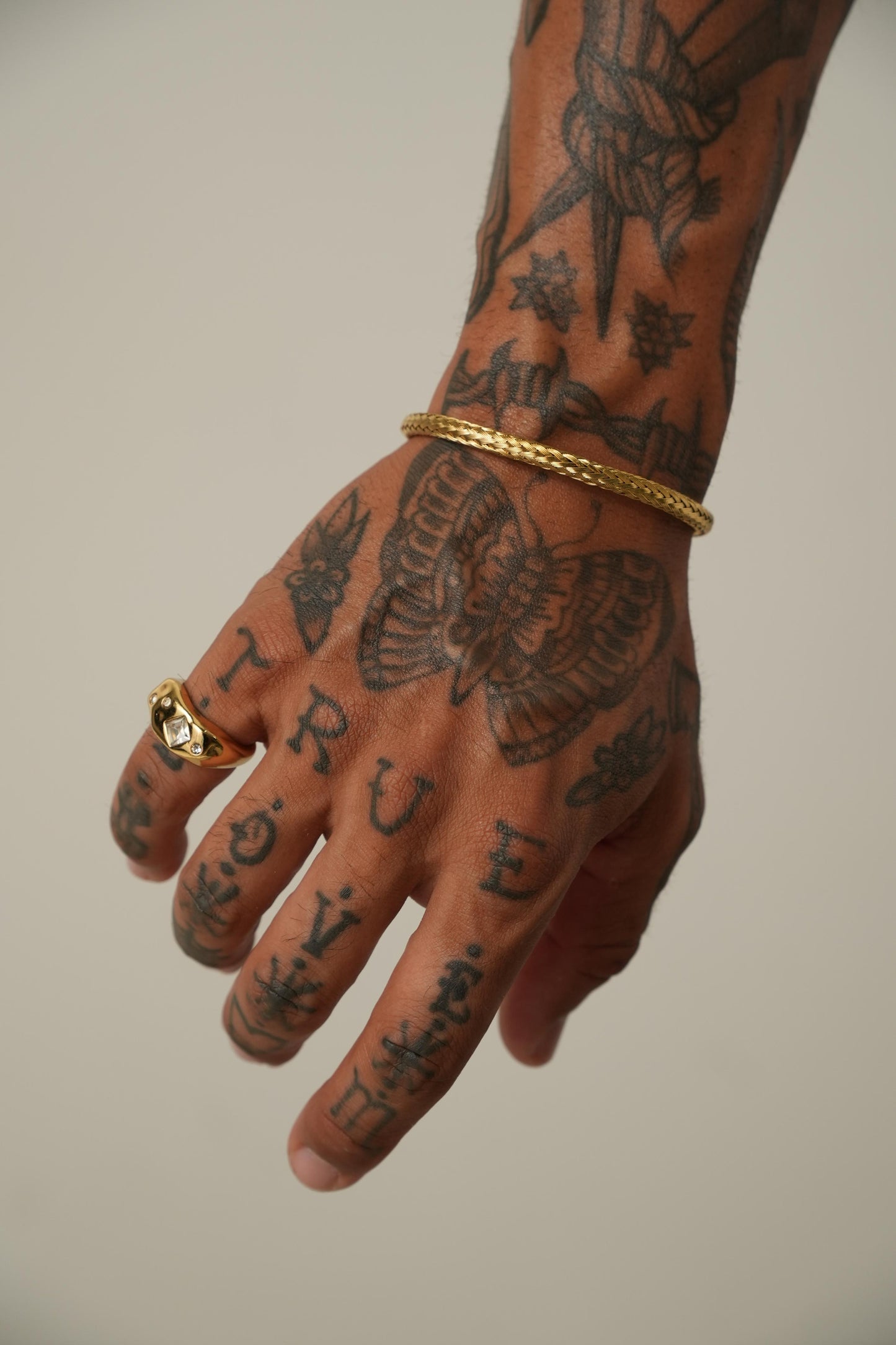 Bracelete Axle de Aço Inoxidável Dourado
